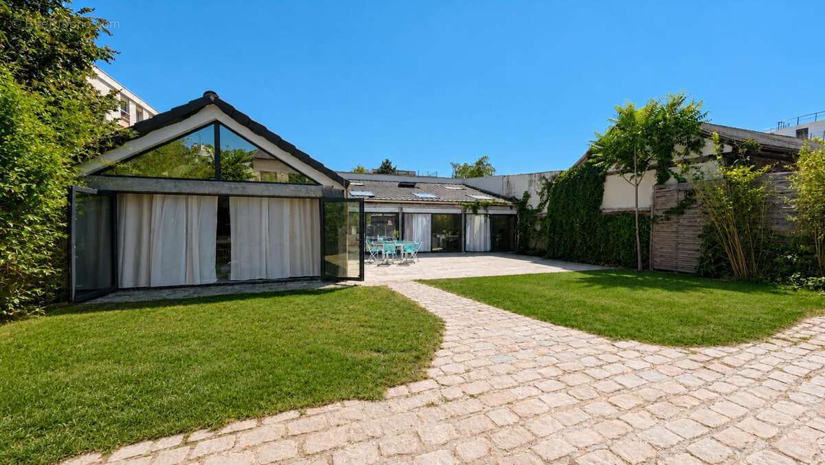 Maison 120 m² à Saint-Maur-Des-Fosses  - photo 18