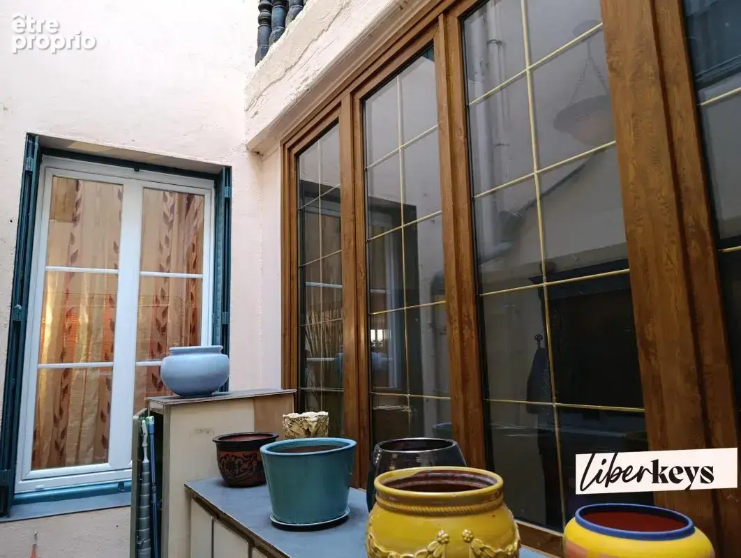 2 appartements standing mono propriété - 229,50 m² - comble aménageable - balcons - garage double- caves - vue quai de saône - photo 25