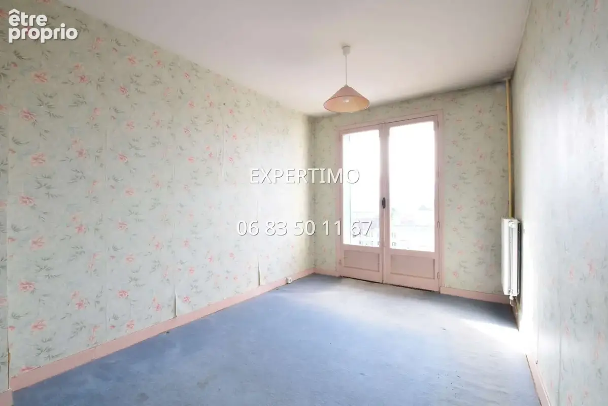 Appartement lumineux - 3 chambres poss. 4 - fort potentiel - photo 6