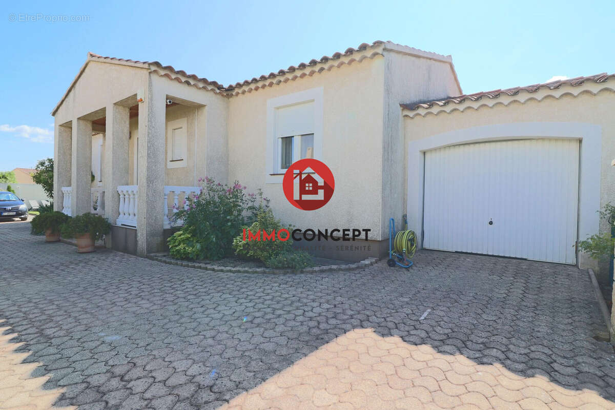 Maison à LAUDUN-L'ARDOISE