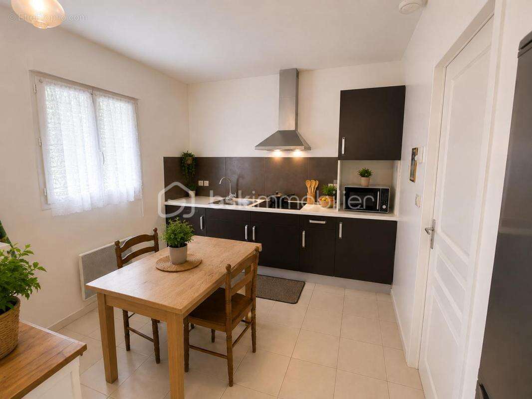 Maison de plain-pied 76 m² – 2 chambres – Jardin de 668 m² – Vendue louée – Rétaud - photo 4