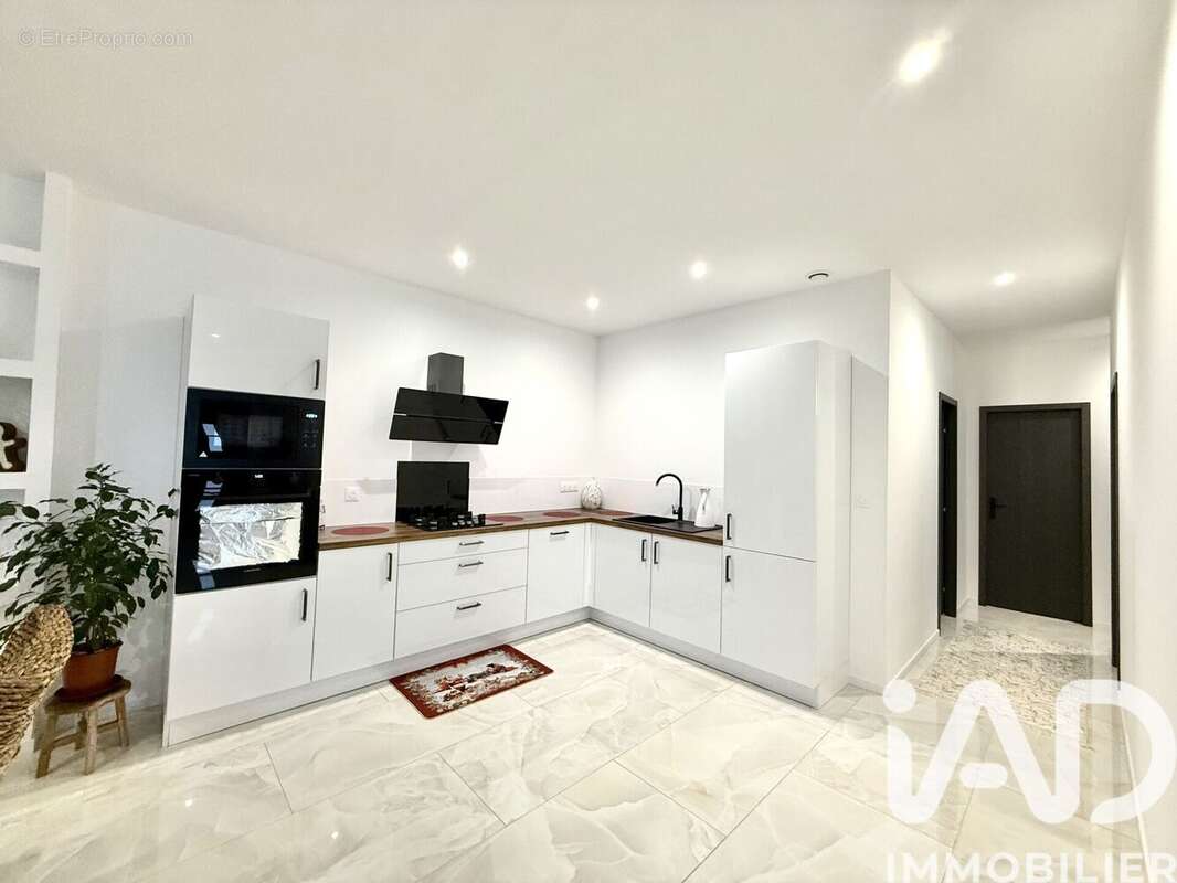 Photo 2 - Maison à BONCHAMP-LES-LAVAL