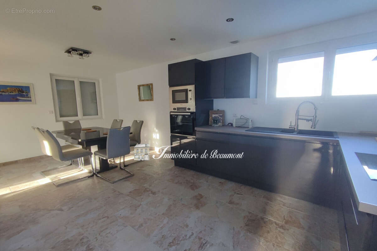 Maison 85 m² à Beaumont-Le-Roger  - photo 4