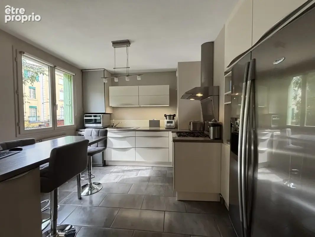 Appartement 4 pièces 85 m² à vendre à Bourg-De-Peage (26300) - photo 4