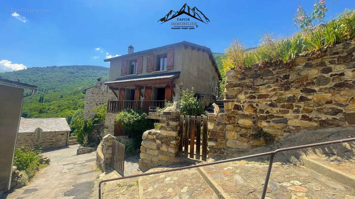 Maison 4 faces en pierre avec jardin - AYGUATÉBIA-TALAU - photo 3