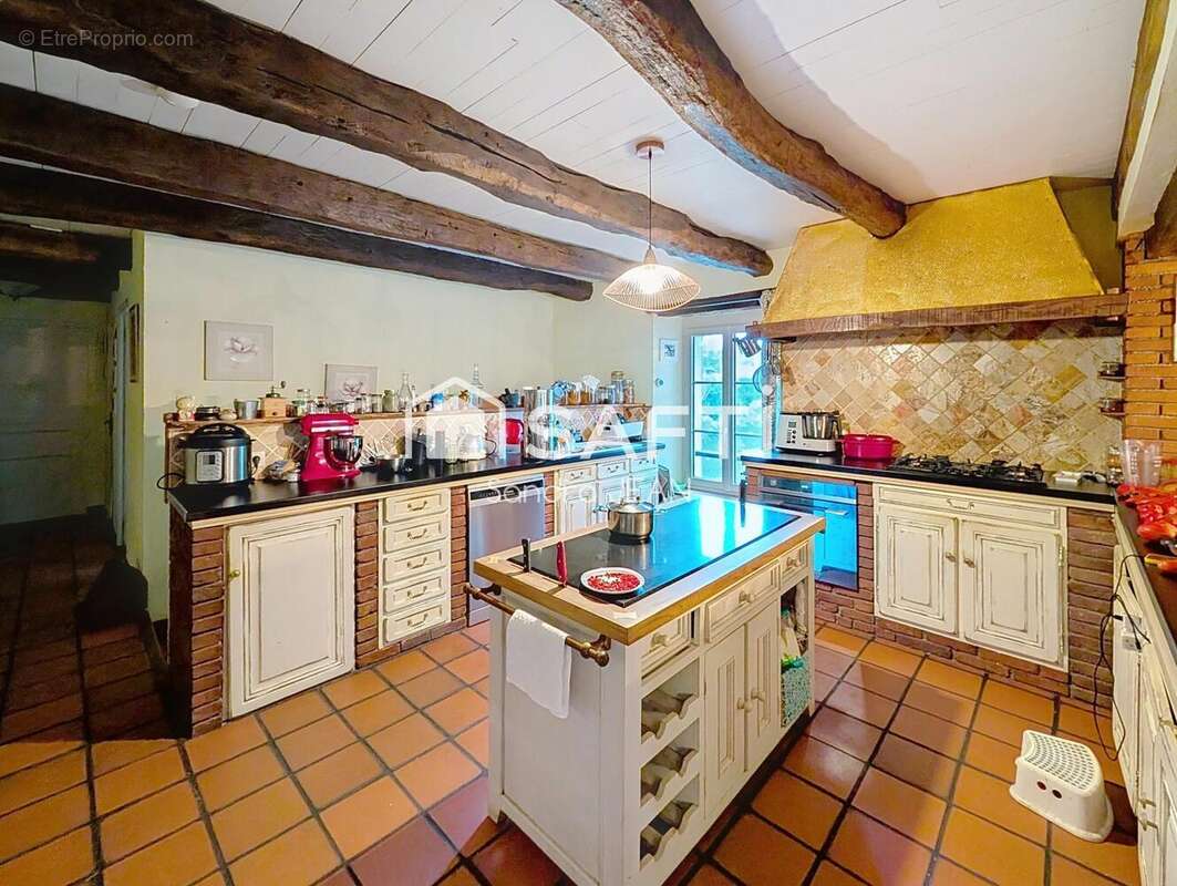 Photo 5 - Maison à MIRANDOL-BOURGNOUNAC