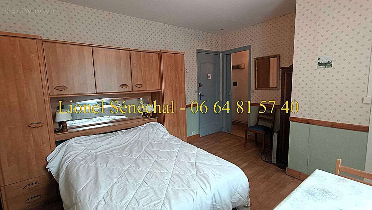 Opportunité rare : immeuble de caractère avec 12 studios dans une demeure de prestige en plein centre-ville de Bagnoles-de-l'Orn - photo 7