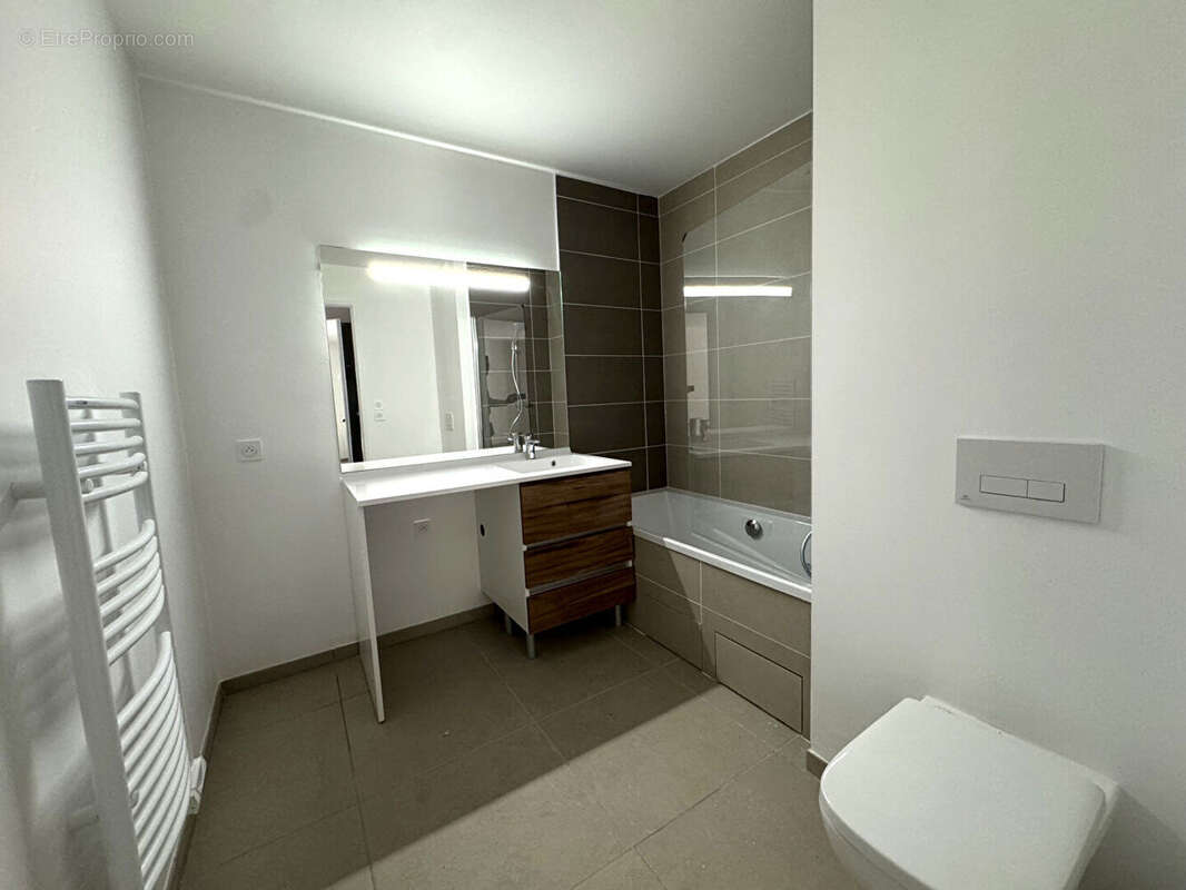 Appartement 2 pièces de 40m² + 14m² de Terrasse + Parking sous-sol ! Cote Pavée - photo 6