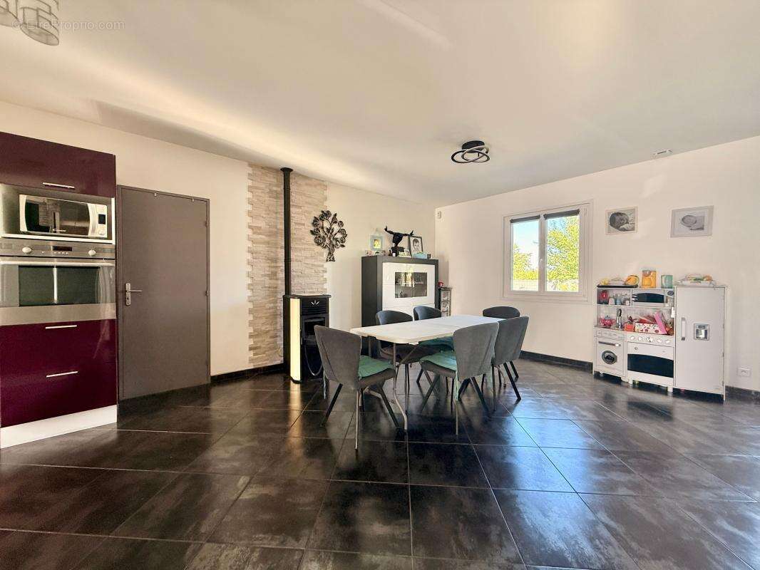 Maison de plain-pied - 3 chambres - terrain 1000 m² - garage - photo 11