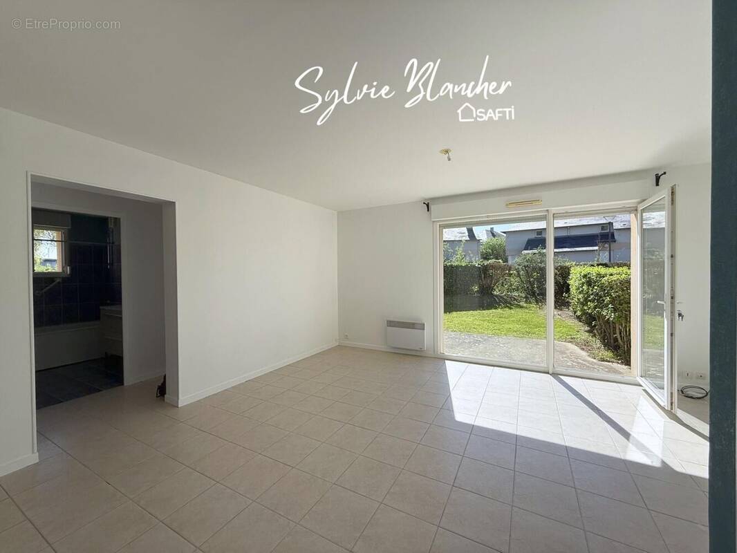 Photo 1 - Appartement à HEROUVILLE-SAINT-CLAIR