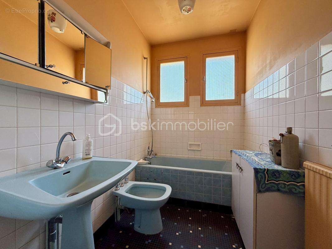 Maison élevée sur sous-sol de 152 m² - photo 6