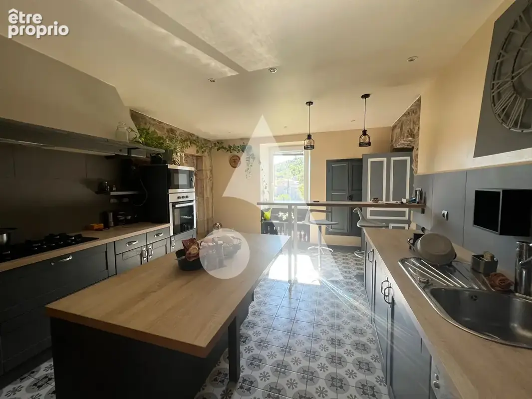 Maison en pierre à vendre aux Assions. Proche Les Vans. Charme authentique, dépendances et fort potentiel - photo 2