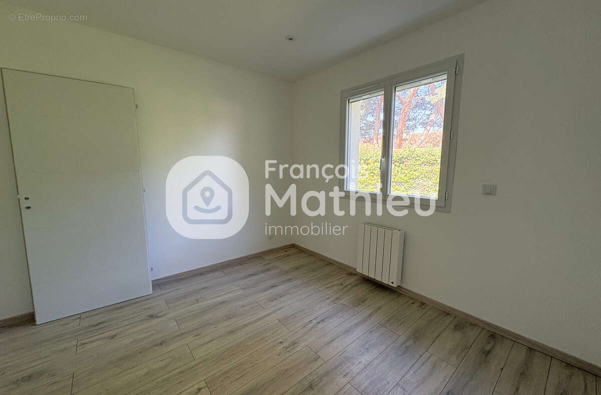 Saint-André-le-Bouchoux - Maison neuve de plain-pied sur 503 m2 de terrain - photo 9