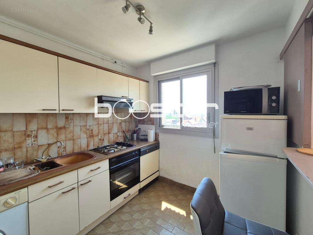 Côte Pavée - T3 de 65m² en dernière étage avec stationnement et cave - photo 5