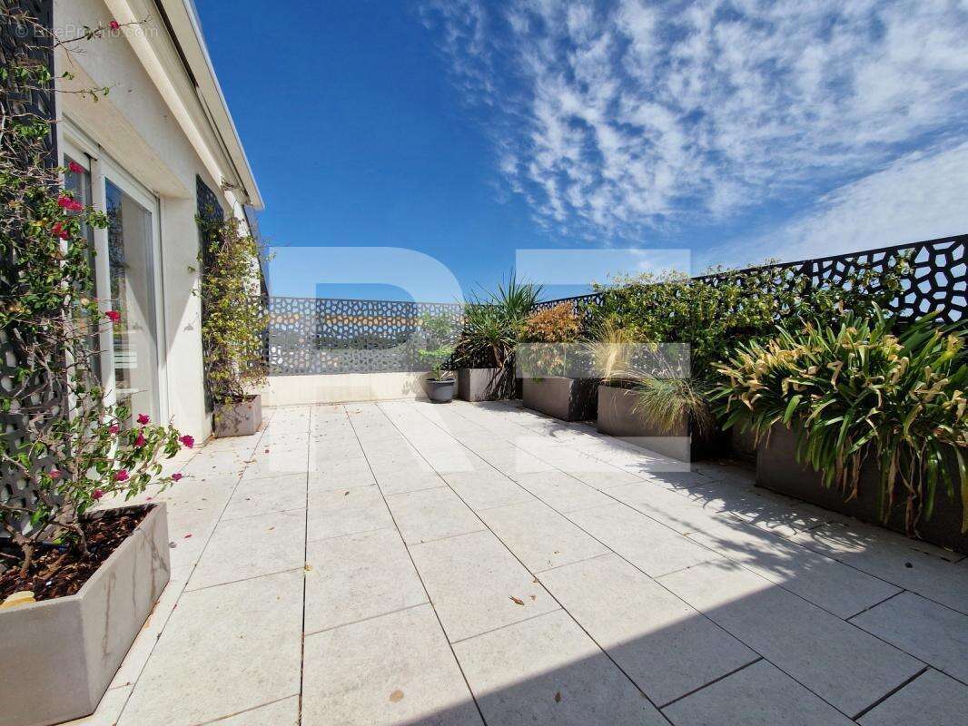 Nimes appartement 69 m² 2 chambres terrasse 42 m² garage - photo 3