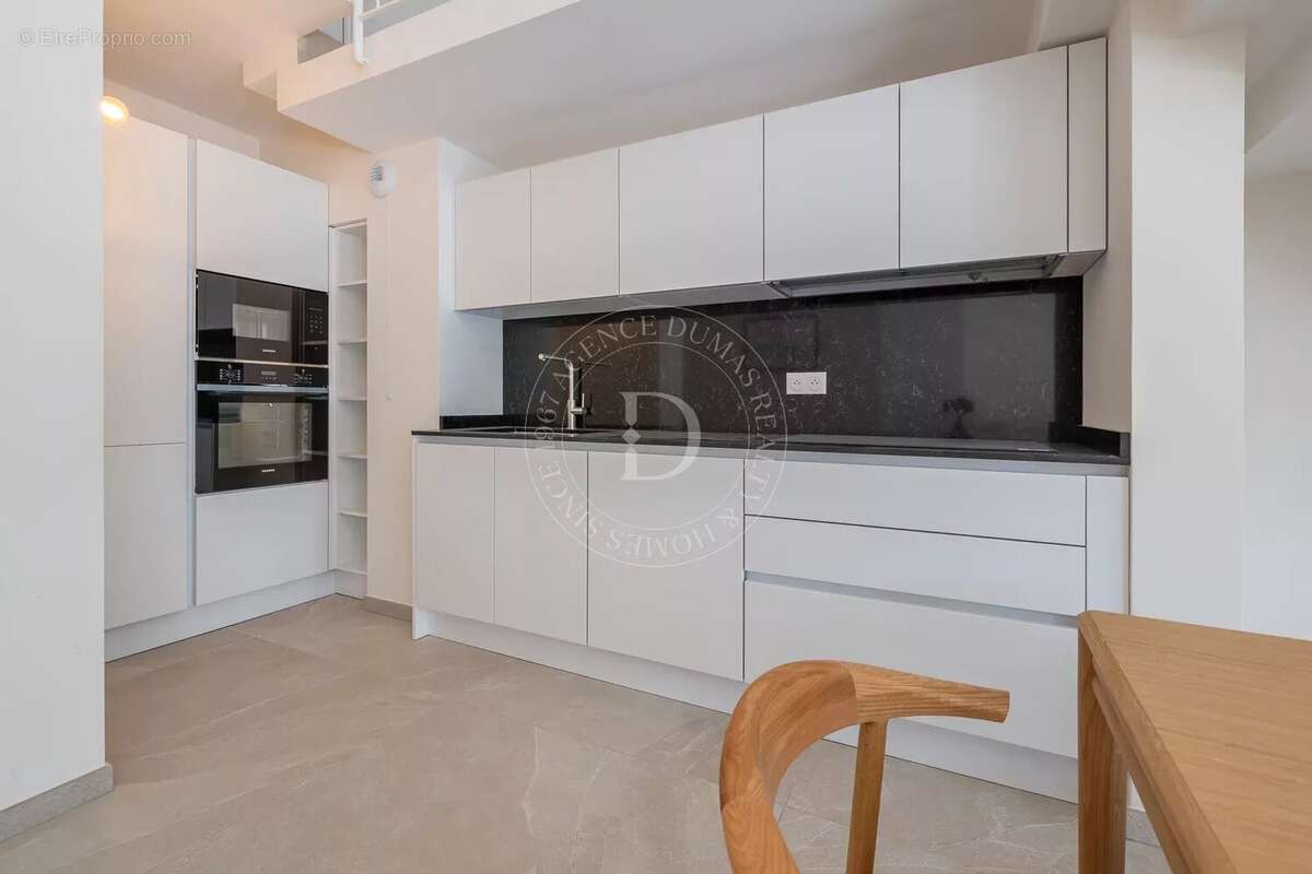 Duplex avec terrasses au dernier étage - photo 3