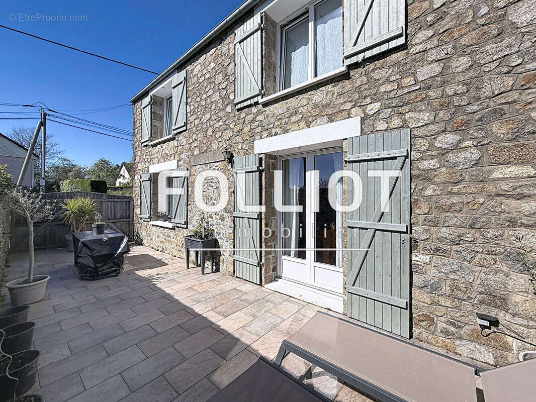 Maison à AGON-COUTAINVILLE