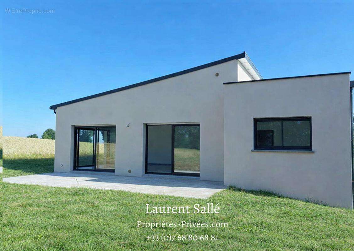 Maison neuve RE 2020 de plain-pied 125 m²  - 3 chambres - Sous-sol - Terrain 2 020 m² - - photo 2