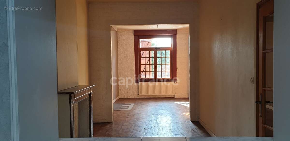 Maison de 1930 pleine de charme avec jardin, terrasse couverte et 4 chambres à Valenciennes (59) - photo 3