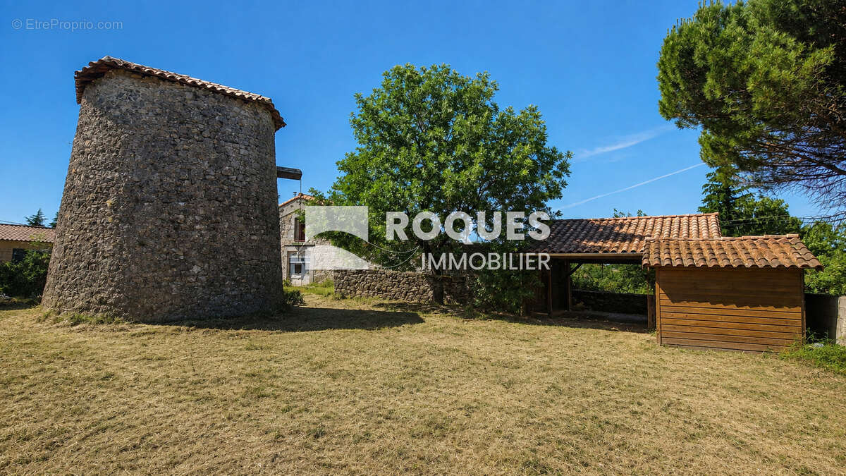 A VENDRE, Le Caylar, belle maison en pierres, cinq pièces, 146 m2 habitables, sur 1303 m2 de terrain - photo 7