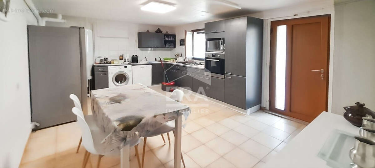 Maison 168m² à saint-étienne-du-grès - photo 10