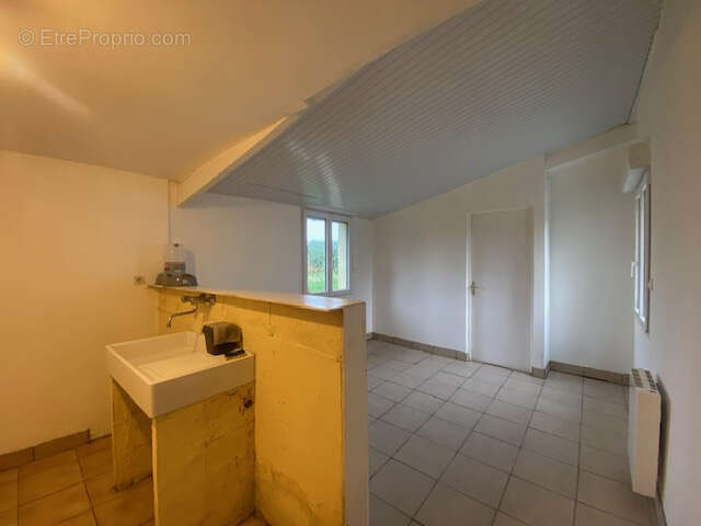 Maison à REGUINY