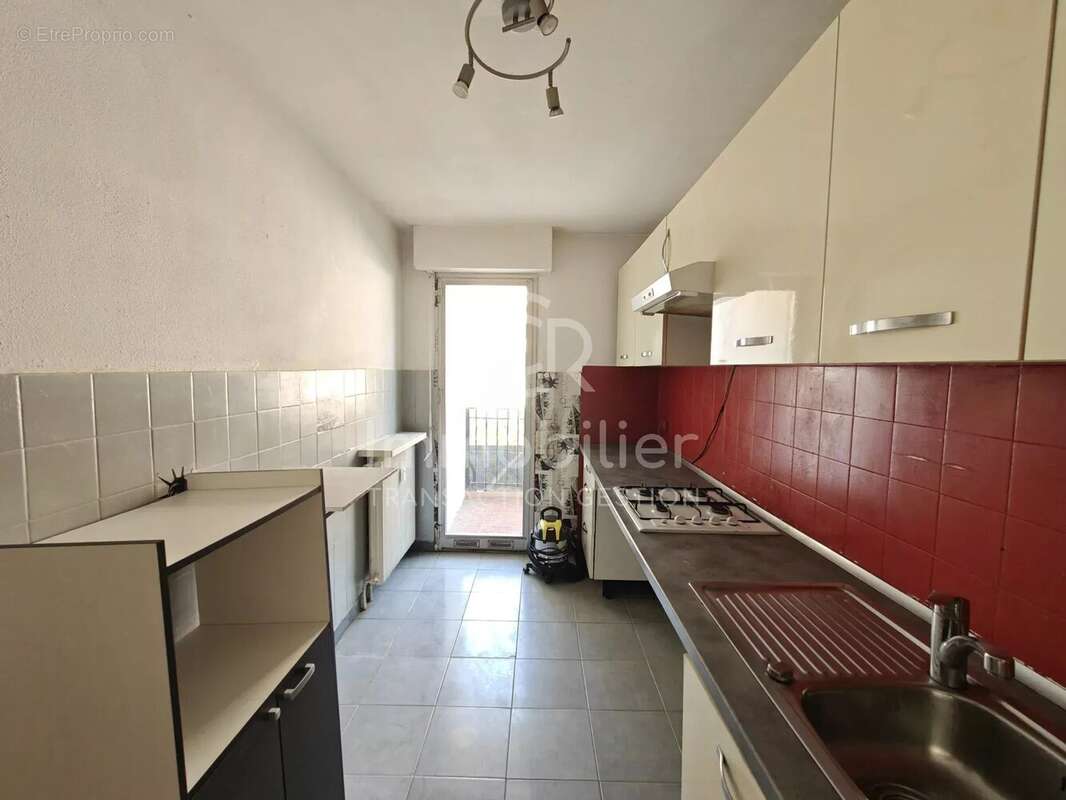T3 traversant sud-nord 62m² rez-de-jardin - photo 7