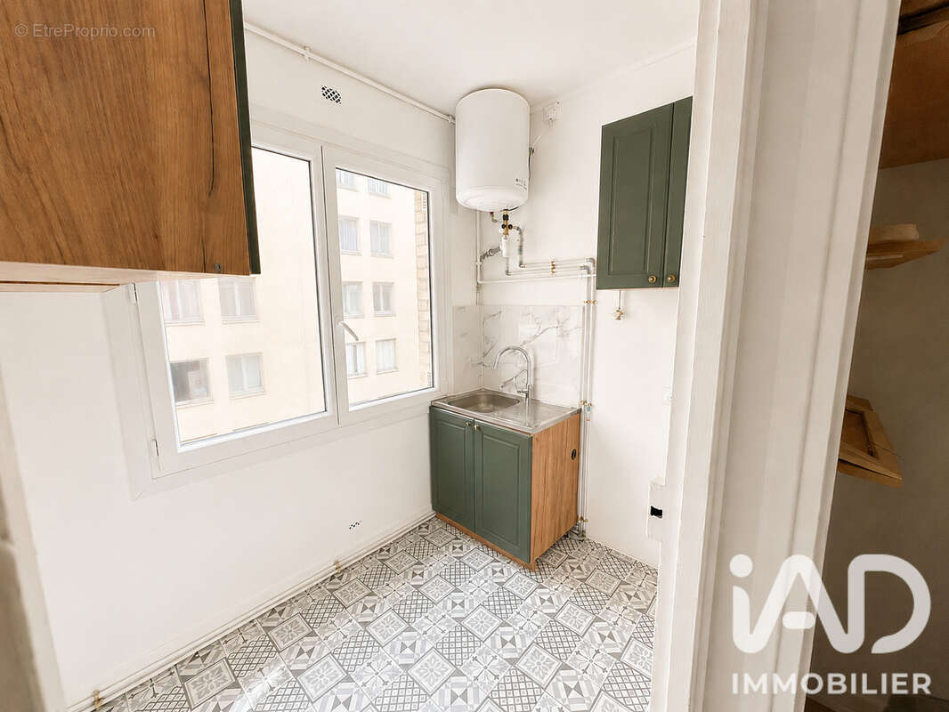 Photo 4 - Appartement à COURBEVOIE