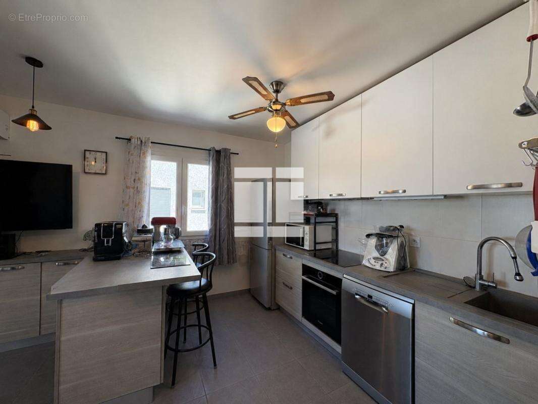 Appartement T2 à vendre avec terrasse, local privatif et place de parking - photo 4
