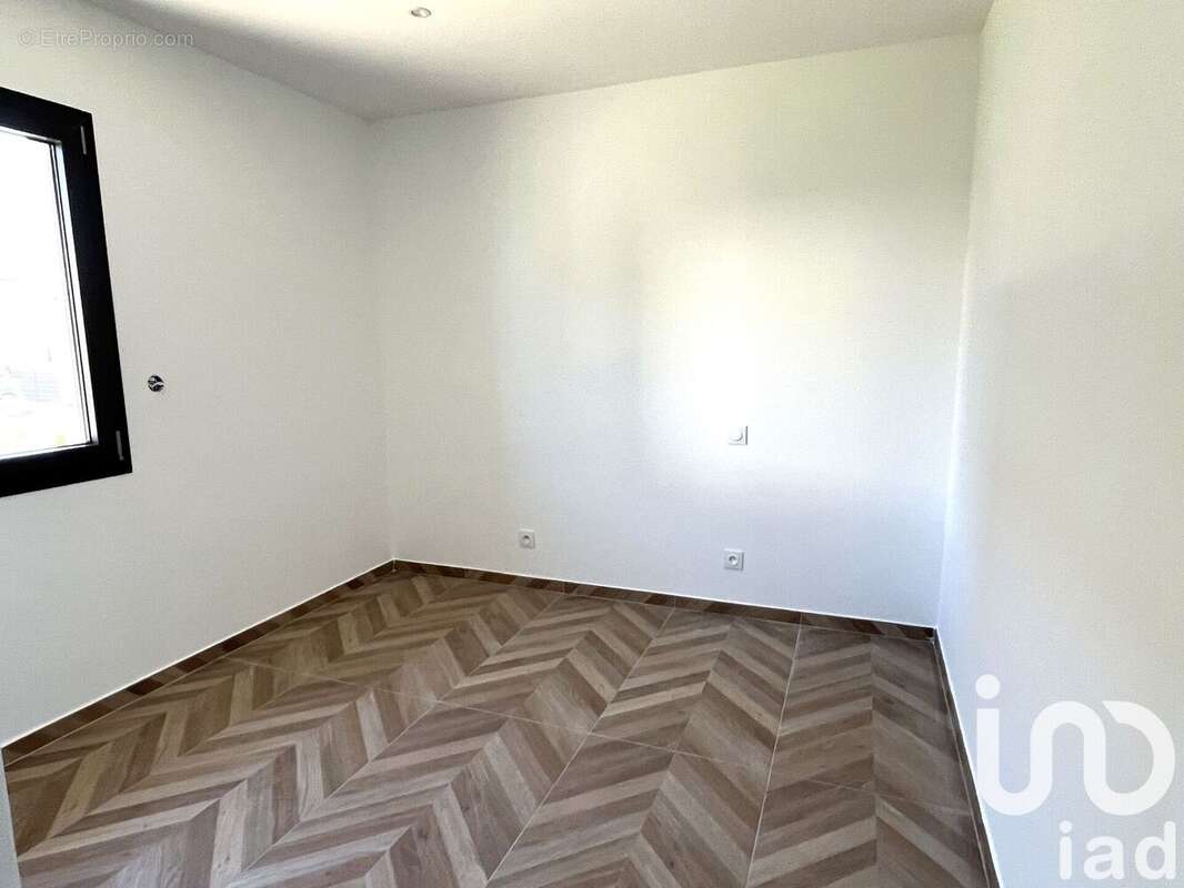 Photo 6 - Maison à LAUDUN-L&#039;ARDOISE