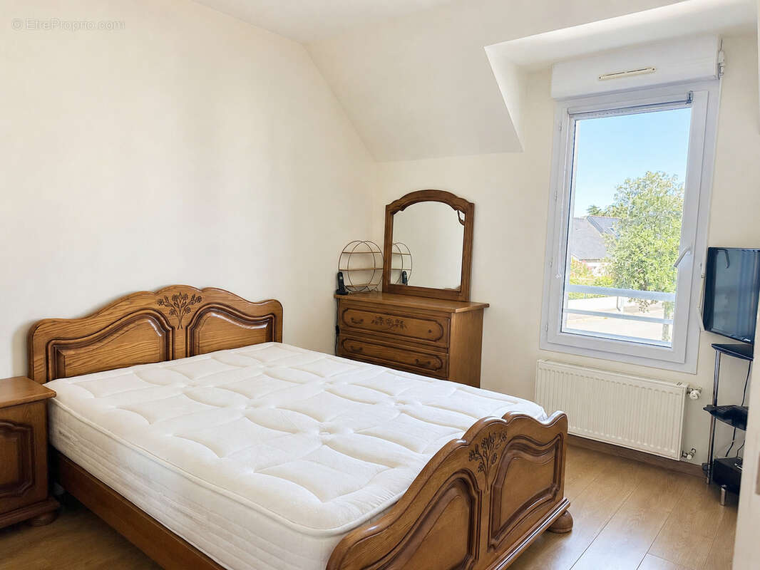 Maison familiale de 125m2 - 4 chambres - quartier certé à trignac - photo 10