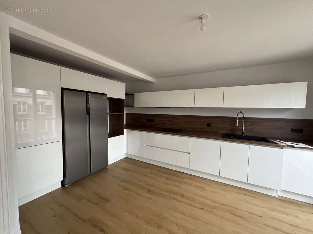 Appartement de 90 m² avec parking  - Secteur prisé rue Blatin - photo 2