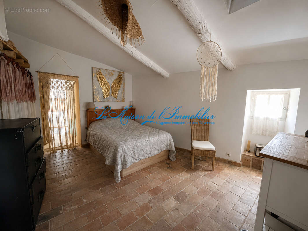 A proximité de Gagnières au calme maison de village en pierre de type F3 avec 653m2 de terrain. - photo 5