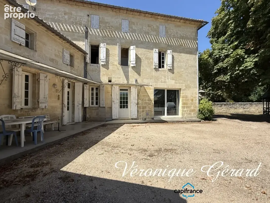 Belle maison en pierre de taille de 252 m², 7 chambres, combles aménageables, jardin paysager,3 garages - photo 4