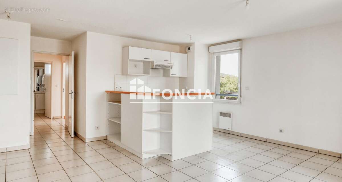 MONDONVILLE, T3 avec grande terrasse et 2 places de parking - photo 2