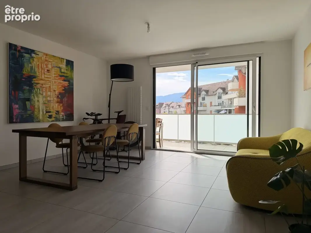 Appartement 4 pièces 80 m² à vendre à Saint-Genis-Pouilly (01630) - photo 2