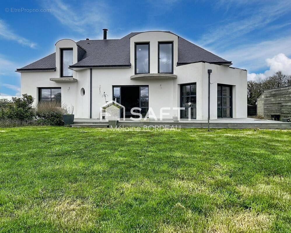 Photo 1 - Maison à PLUMERGAT