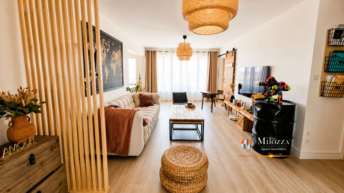 Appartement familial 113 m² avec 4 chambres, balcon, cave et garage - Villefontaine - photo 2