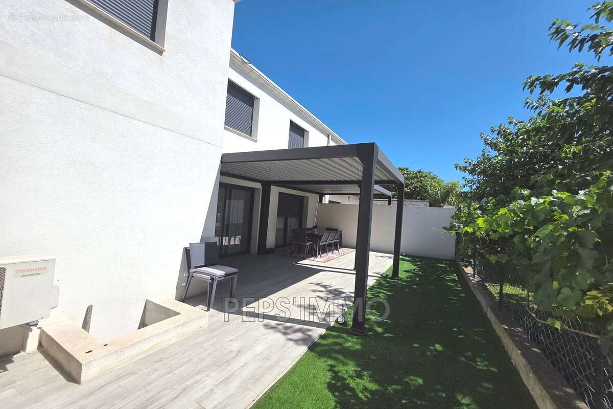 Maison 112 m² à Gignac-La-Nerthe  - photo 2