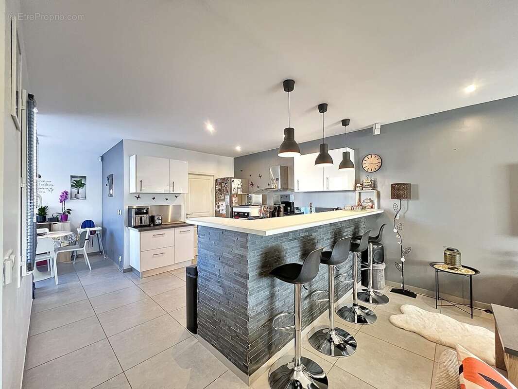Maison 111 m² à Tignieu-Jameyzieu  - photo 9