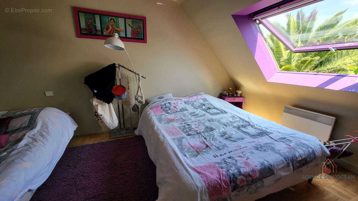 Maison familiale avec 3 chambres et terrain arboré à La Grande Prairie - photo 11