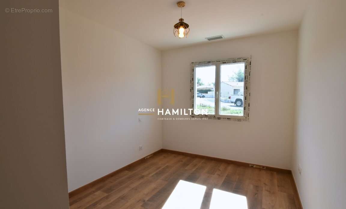 Maison neuve de plain-pied avec 4 chambres et garage - photo 11