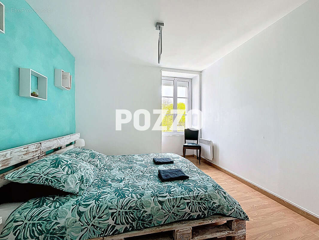 Maison 6 pièces à Genêts : 3 logements communicants avec beau potentiel locatif - photo 5