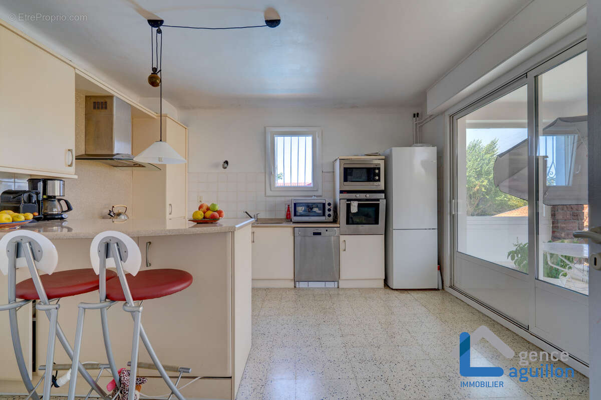 Maison de 170m2 comprenant deux appartements t3 - photo 5