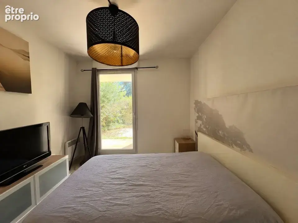 Appartement T3 65.88m² en rez de jardin avec stationnement - photo 10