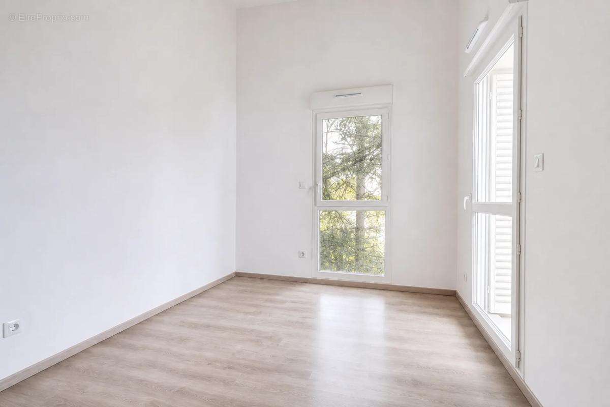 Duplex moderne avec terrasses, stationnement Craponne centre - photo 8