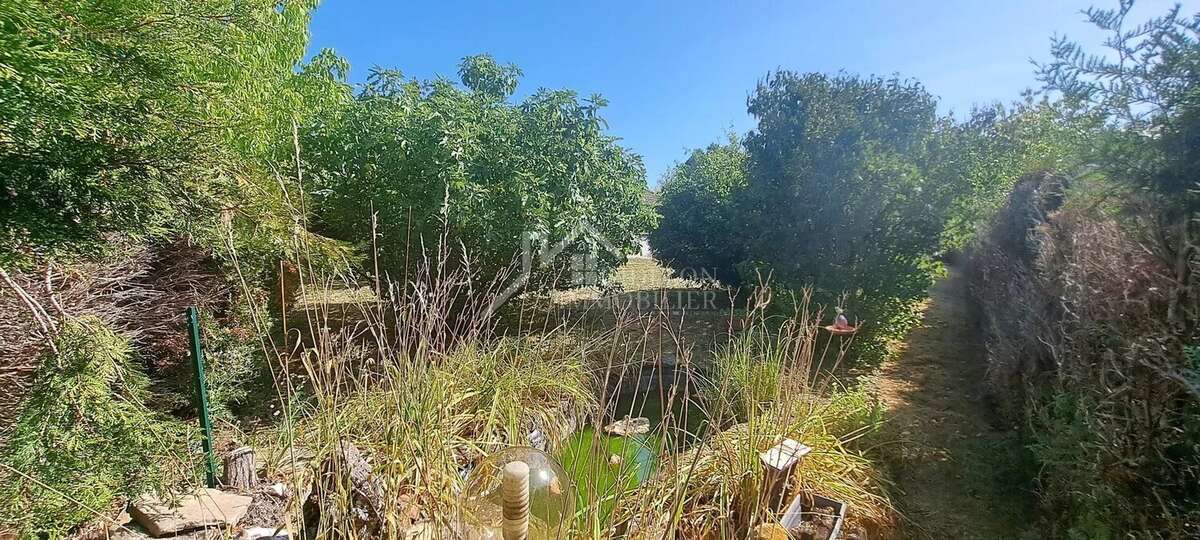 Pavillon de plain pied - 99m² hab + 2 garage - 1154m² de terrain - photo 13