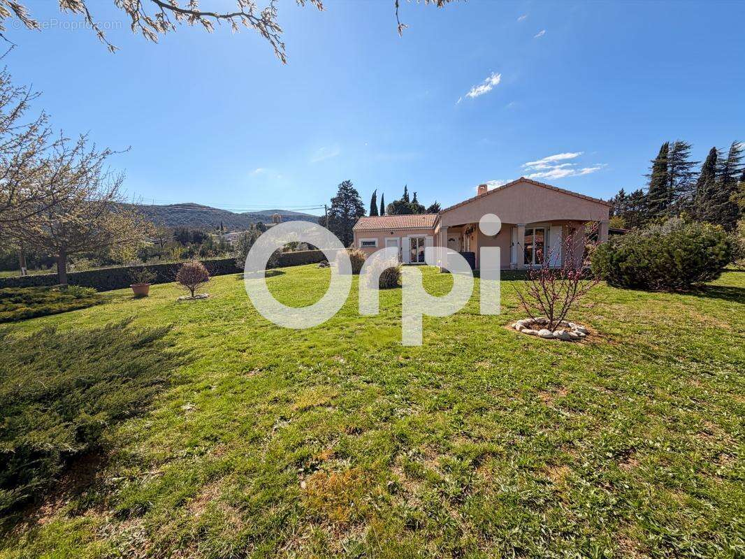 Maison À Vendre sur 1500m² de terrain arboré - photo 20