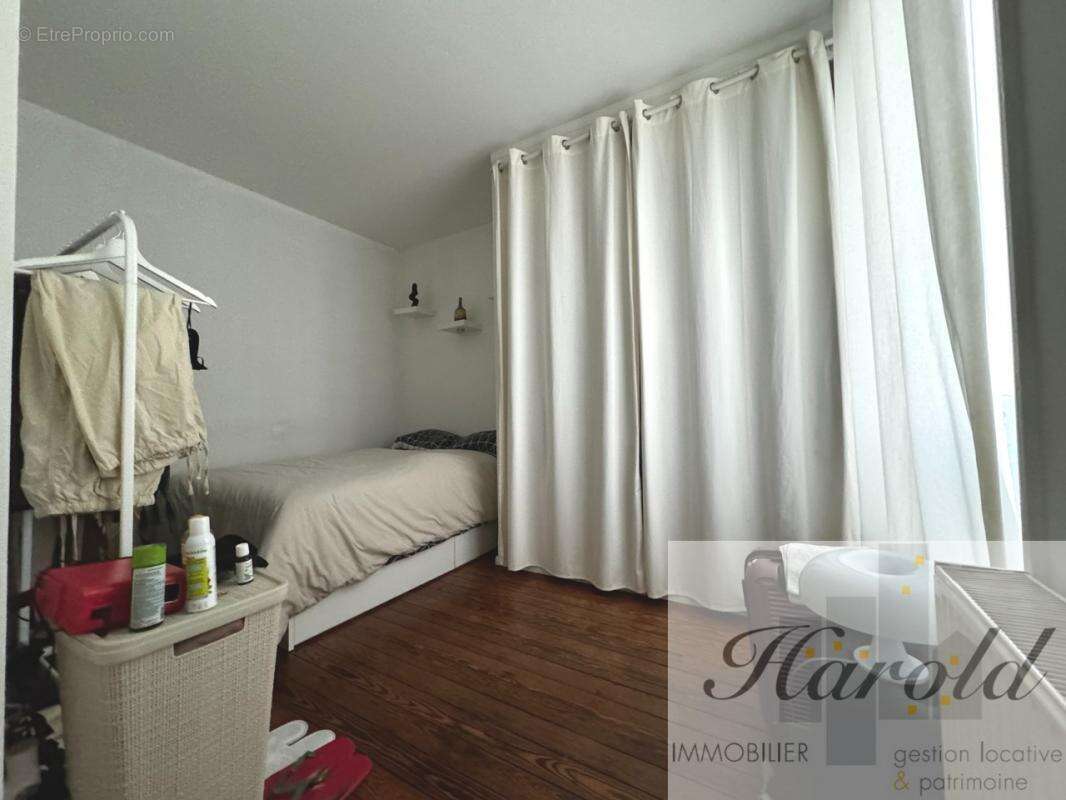 titre - Appartement à PARIS-15E
