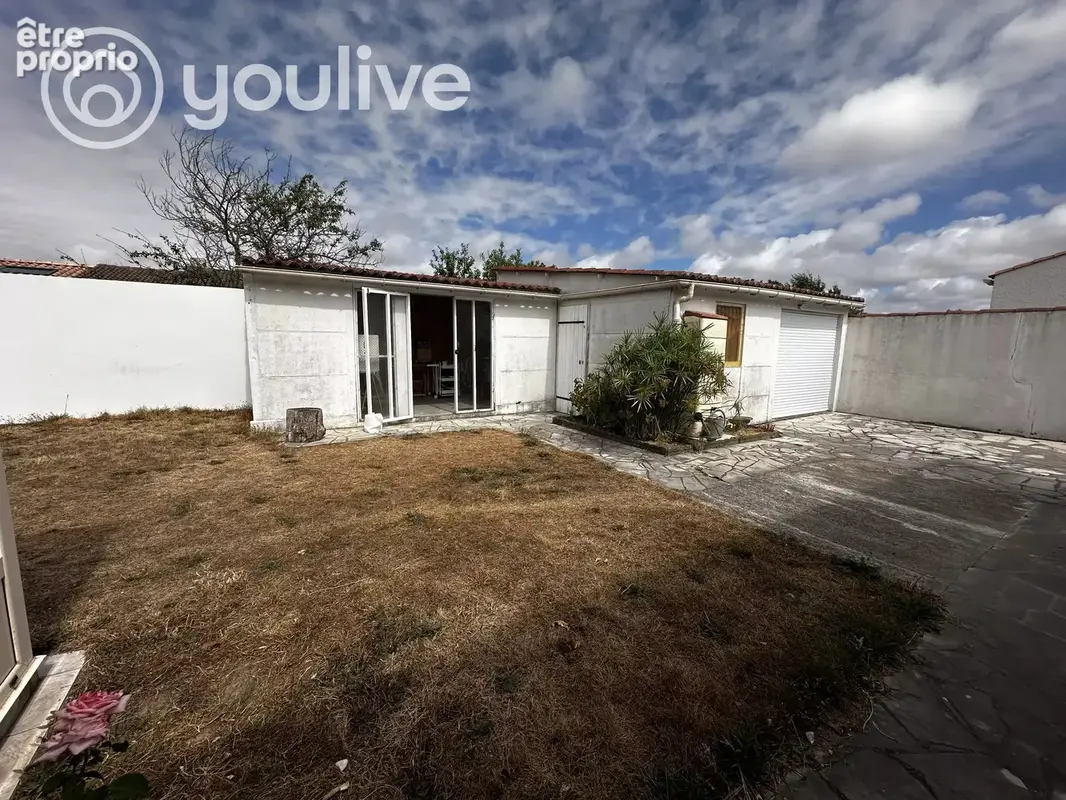 Maison plain-pied 103 m² – 3 chambres – jardin – véranda – grand garage - photo 13